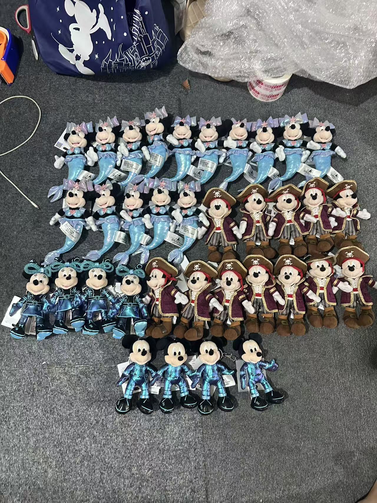 Mermaid Minnie, pirate Mickey and blue costume charms