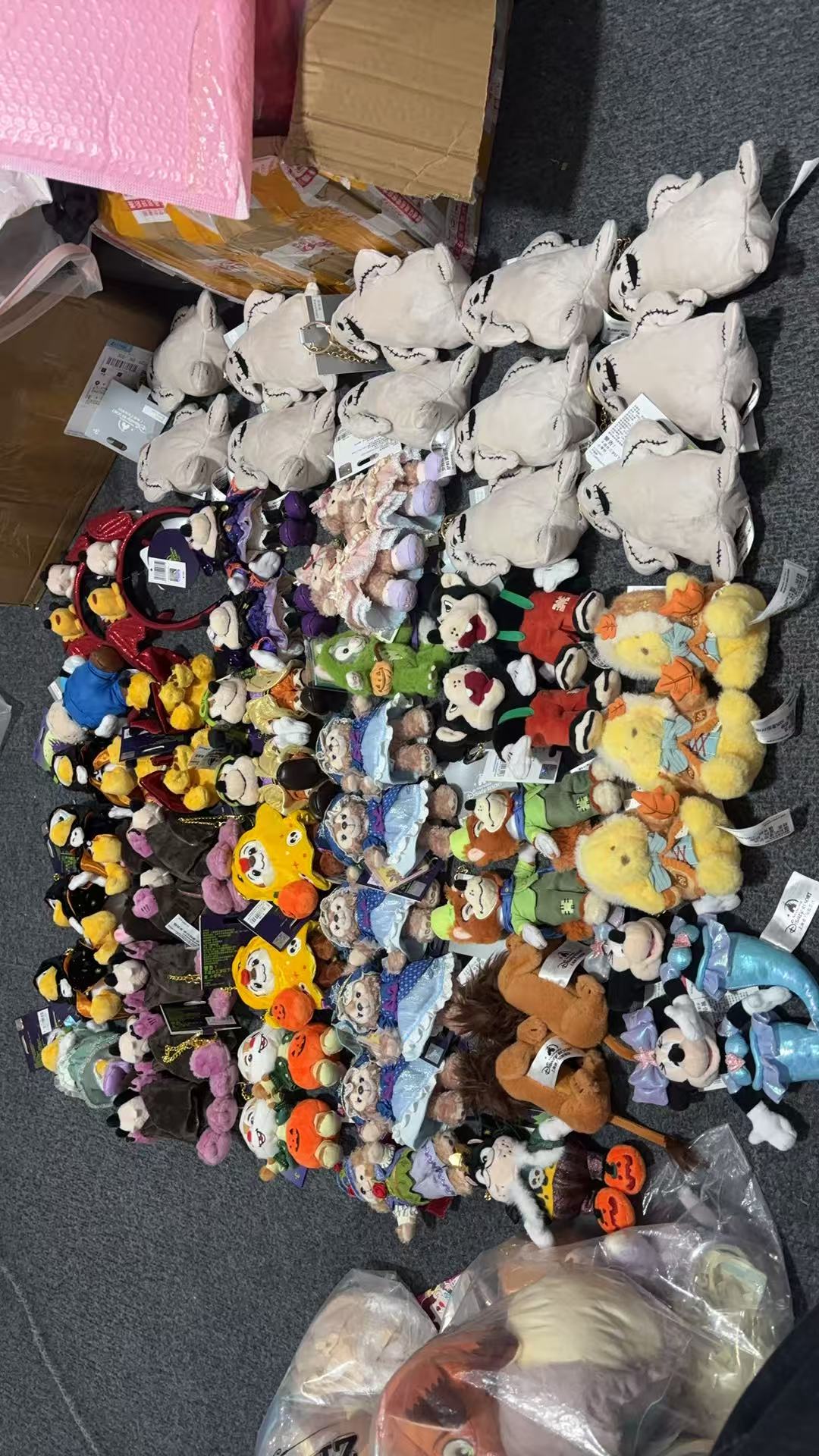 Seasonal Disney character charms arranged in rows